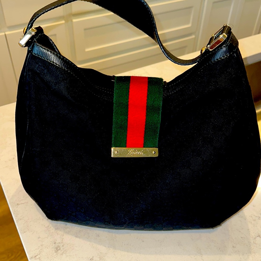 Gucci black hobo bag. Pre love condition. Nice bag